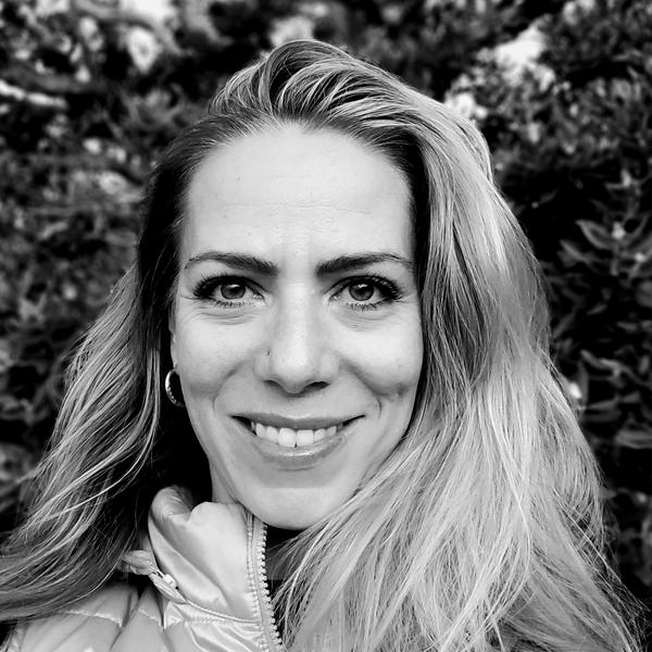 smiling female with long hair - professor Joanna Hesketh