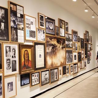 Display of White Man's Burden, with ANTH 335 students viewing a portion.